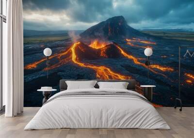 An aerial view of a volcanic eruption in Iceland, showing lava flowing down the side of the mountain. The sky is dramatic with dark clouds and the lava is glowing red and orange. Wall mural