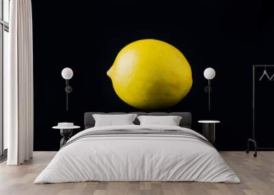 fresh lemon fruit on the black background Wall mural