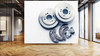 New auto parts brake drums, pads, cylinders on white background Wall mural