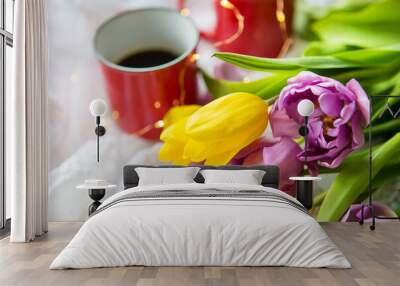 Beautiful morning, two cups of coffee and a bouquet of bright tulips Wall mural