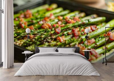 Grilled asparagus and bacon on a baking tray, showcasing a delicious and healthy meal option. The vibrant green of the asparagus contrasts with the crispy bacon, making it visually appealing. Wall mural