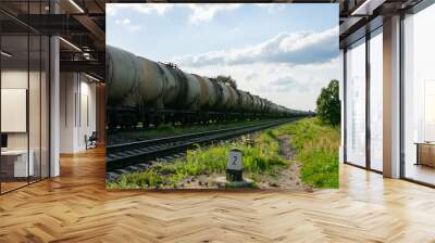 Old barrels of oil on the railway. Wall mural