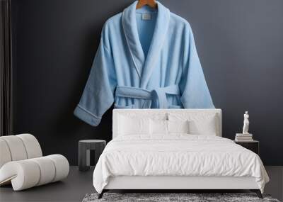 Soft and fluffy bathrobe in pastel blue. AI generated Wall mural