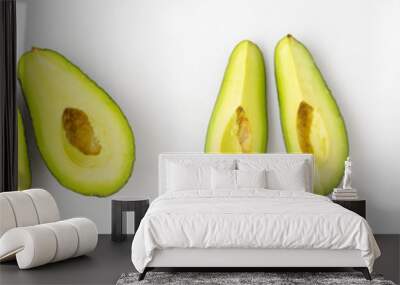 Whole and sliced avocado on white background, top view Wall mural