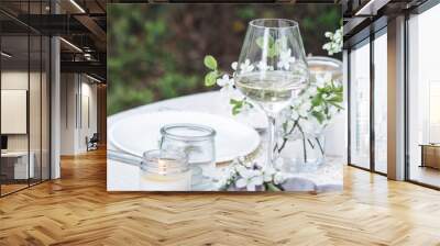 Rustic elegant eco friendly zero waste trendy wedding reception table decor with fresh spring apple cherry flowers in bloom. Beautiful marriage decoration, holiday outdoors in the family garden banner Wall mural