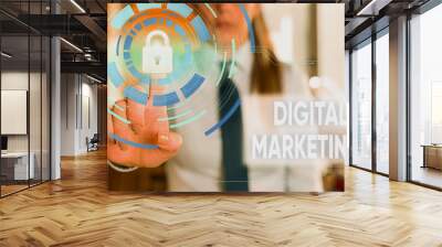 Conceptual hand writing showing Digital Marketing. Concept meaning market products or services using technologies on Internet Female human wear formal work suit presenting smart device Wall mural