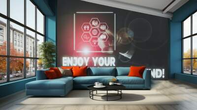 Conceptual hand writing showing Enjoy Your Weekend. Concept meaning wishing someone that something nice will happen at holiday Picture photo network scheme with modern smart device Wall mural