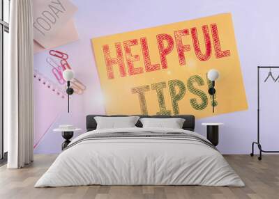 Conceptual hand writing showing Helpful Tips. Concept meaning advices given to be helpful knowledge in life Cardboard and writing equipment placed above pastel backdrop Wall mural