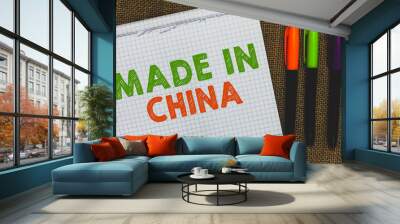 Conceptual hand writing showing Made In China. Business photo text Wholesale Industry Marketplace Global Trade Asian Commerce Open notebook jute background colorful markers Expressing ideas Wall mural