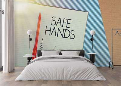 Conceptual hand writing showing Safe Hands. Concept meaning Ensuring the sterility and cleanliness of the hands for decontamination Striped paperboard cardboard office study supplies chart Wall mural