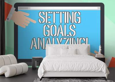 Conceptual hand writing showing Setting Goals Analyzing. Business photo showcasing Helped to be realistic about what can really achieve Hu analysis Hands Pointing on a Blank Color Tablet Screen Wall mural