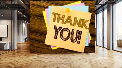 Conceptual hand writing text caption inspiration showing Thank You. Business concept for Thanks Message written on sticky note paper on the wooden background. Wall mural