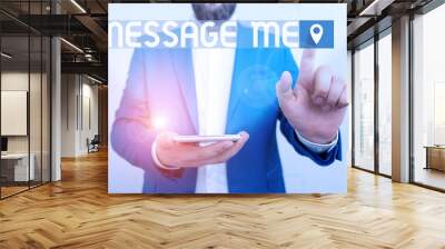 Handwriting text writing Message Me. Conceptual photo To ask someone to send you a short text from one mobile device Businessman in the blue suite with lap top pointing with finger Wall mural