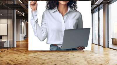 A woman in a white shirt is holding a laptop and points upwards Wall mural