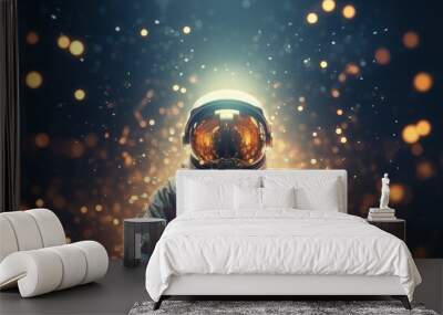 Space suit standing in the dark with light at the back. Gold glitter effect. Lots of copy space. Wall mural