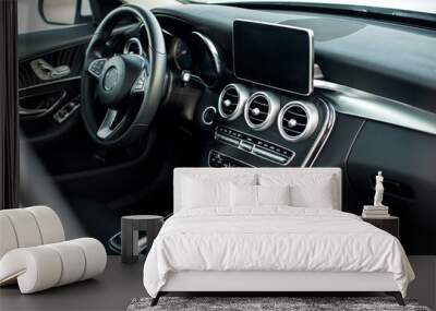 Modern car interior, black perforated leather, aluminum, details controls, leather steering wheel Wall mural