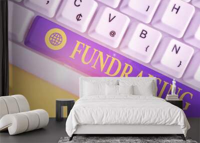 Text sign showing Fundraising. Business photo showcasing act of collecting or producing money for a particular purpose White pc keyboard with empty note paper above white background key copy space Wall mural