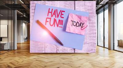 Text sign showing Have Fun. Business photo showcasing wish somebody good and enjoyable time when they do something Wrinkle paper and cardboard plus stationary placed above wooden background Wall mural