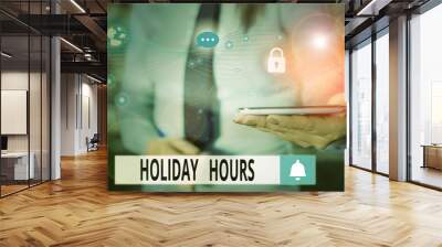 Text sign showing Holiday Hours. Business photo text employee receives twice their normal pay for all hours Picture photo system network scheme modern technology smart device Wall mural