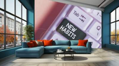 Text sign showing New Habits. Business photo text change the routine of behavior that is repeated regularly White pc keyboard with empty note paper above white background key copy space Wall mural