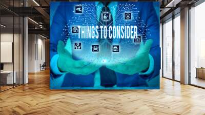 Text sign showing Things To Consider. Business photo showcasing think about carefully especially in making decisions Male human wear formal work suit presenting presentation using smart device Wall mural