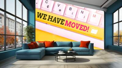 Text sign showing We Have Moved. Business photo text To go from one residence or location to another Relocate White pc keyboard with empty note paper above white background key copy space Wall mural