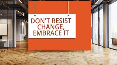 Word writing text Don t not Resist Change, Embrace It.. Business concept for Be open to changes try new things positive Hanging board message communication open close sign orange background Wall mural