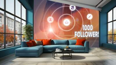 Writing note showing 1000 Followers. Business concept for number of individuals who follows someone in Instagram Wall mural