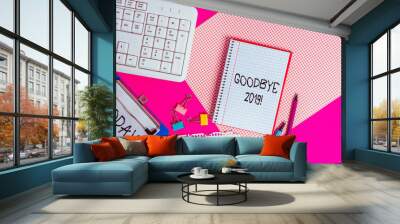 Writing note showing Good Bye 2019. Business concept for express good wishes when parting or at the end of last year Writing equipments and computer stuffs placed above colored plain table Wall mural