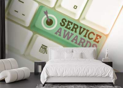 Writing note showing Service Awards. Business concept for Recognizing an employee for his or her longevity or tenure Wall mural