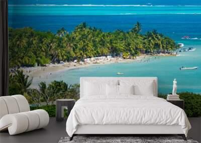 Landscape of the beach of San Andres island and Providencia Archipelago in Colombia with blue ocean and green palms and vegetation with boats and tourists   Wall mural