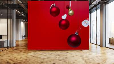 Christmas decorations on a red background. Holiday season  concept Wall mural