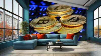 Bitcoin, new Virtual money concept. Gold bitcoins with blue lighting computer keyboard background. Golden coin with icon letter B. Mining or blockchain technology Wall mural