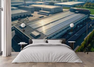 Aerial view of modern industrial facility with solar panels on roof Wall mural