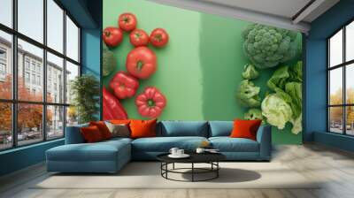 Assorted vegetables on split green background Wall mural