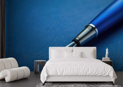 Close-up of blue fountain pen on textured surface Wall mural