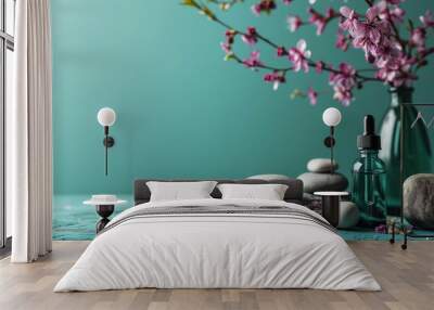 Essential oil with stones and cherry blossoms Wall mural