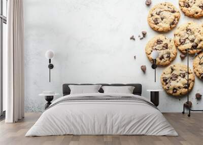 Several chocolate chip cookies on light textured surface Wall mural