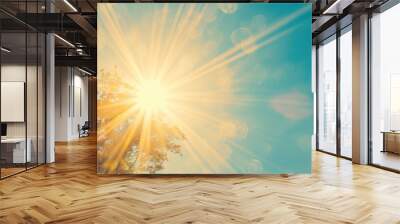 Sun shining through treetops with lens flare Wall mural