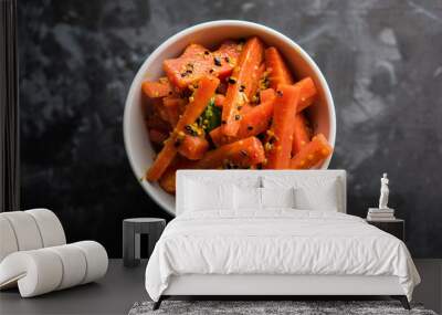 Carrot Pickle / Gajar ka Achar or Loncha in hindi. Served in a bowl over moody background. Selective focus Wall mural