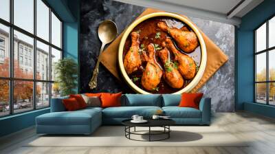 Chicken leg / drumstick curry or Murg Tangri/tangdi masala. Served in a bowl over moody background. Selective focus Wall mural