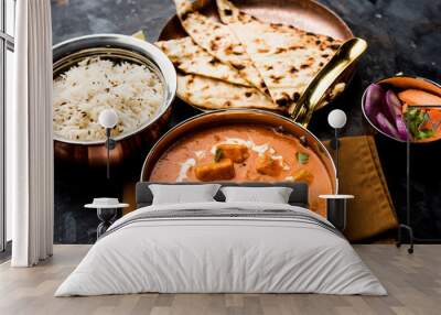 Paneer Butter Masala or Cheese Cottage Curry in serving a bowl or pan, served with or without roti and rice Wall mural