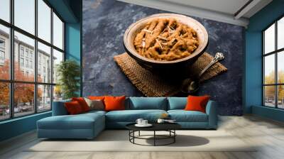 Wheat flour Halwa or Shira or porridge /  Atte ka Halva, Popular healthy dessert or breakfast menu from India. served in a bowl or plate. selective focus Wall mural