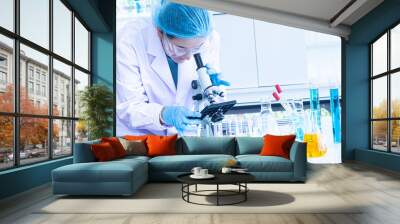 Asian woman scientist, researcher, technician, or student conducted research in laboratory Wall mural