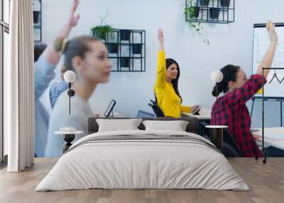 Group of people listening to a presentation speech and working and communicating together in creative office Wall mural