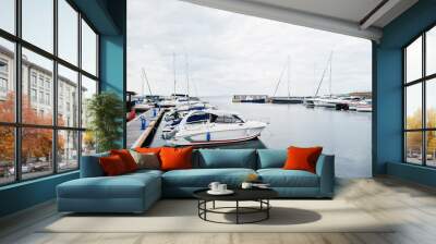  Marine parking of modern motor boats. Luxury yachts docked in sea port. Wall mural