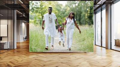 African american family at white nigerian national dress having Wall mural