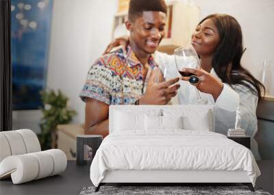 Afro american couple sweethearts drinking wine in kitchen at their romantic date. Wall mural