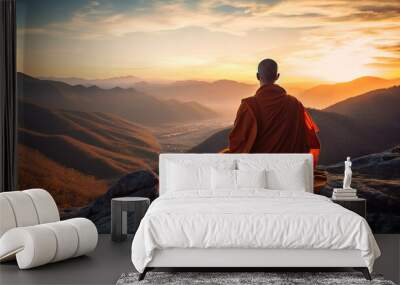 Buddhist monk sitting on top of mountain and looking at sunrise. Generative AI. Wall mural