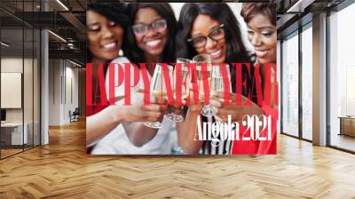 Happy New Year 2021 Angola! Group of partying african girls clinking glasses with sparkling wine champagne. Wall mural